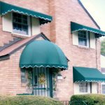 green-door-dome-window-shed-welded-frame-awnings-side